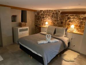 Postel nebo postele na pokoji v ubytování Gîte le Chaudron