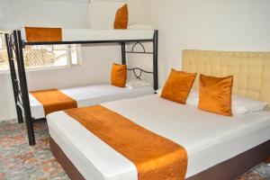 Postel nebo postele na pokoji v ubytování Hotel Flamante Bulevar + 20 fotografií