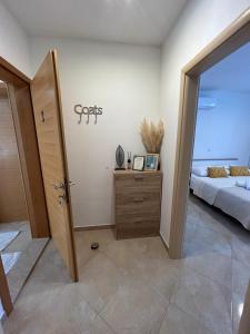 Postel nebo postele na pokoji v ubytování Apartmani Palada