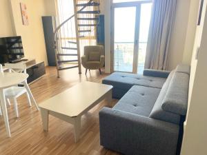 Телевизор и/или развлекательный центр в Sea view apartment