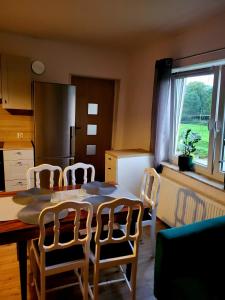 Η κουζίνα ή μικρή κουζίνα στο Apartamenty Pod Hutą
