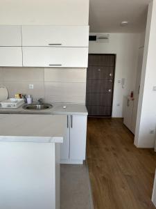 Kuchyň nebo kuchyňský kout v ubytování Apartmani Casper
