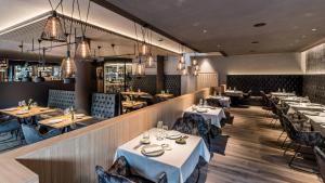 Restoran või mõni muu söögikoht majutusasutuses HOTEL POST alpine cityflair