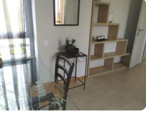 Kuchyň nebo kuchyňský kout v ubytování Spacieux appartement calme
