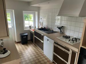 Η κουζίνα ή μικρή κουζίνα στο Maison au cœur des Bertranges