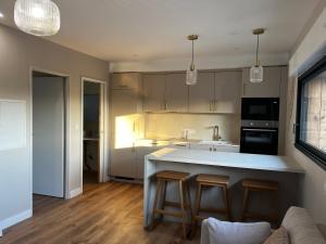 Η κουζίνα ή μικρή κουζίνα στο Appartement 2 pièces wifi climatisation