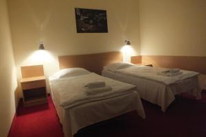 Posteľ alebo postele v izbe v ubytovaní Motel Subaru