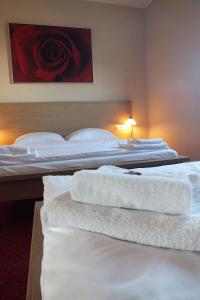 Posteľ alebo postele v izbe v ubytovaní Motel Subaru