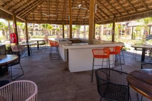 Restaurace v ubytování Lindo condominio cerca de la playa