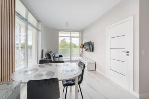Φωτογραφία από το άλμπουμ του Apartament Messa White II z Basenem Letnim by HolidaySun σε Sianozety