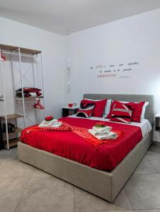 Postel nebo postele na pokoji v ubytování I colori della Sicilia