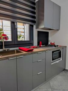 Kuchyň nebo kuchyňský kout v ubytování I colori della Sicilia