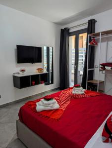 Postel nebo postele na pokoji v ubytování I colori della Sicilia