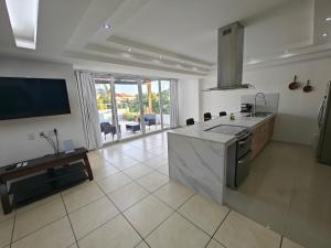 Η κουζίνα ή μικρή κουζίνα στο Hotel Plaza Huatulco Bungalows