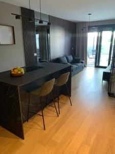 Ein Sitzbereich in der Unterkunft Capitol Suites Exclusive