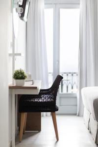 Postel nebo postele na pokoji v ubytování Aurora - Rooms & Suites - Spetses