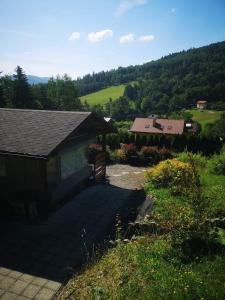 a house with a view of a mountain at Śniegocinka 4 in Brenna