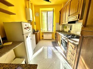 Kuchyň nebo kuchyňský kout v ubytování The Comfort apartment