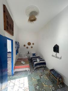 Postel nebo postele na pokoji v ubytování Riad Al Borj