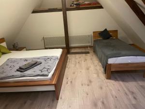 Postel nebo postele na pokoji v ubytování Maisonette Wohnung am Hänferdorf