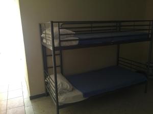 Postel nebo postele na pokoji v ubytování Tenerife Hostel