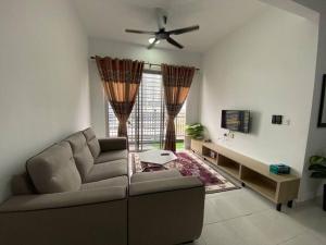 Гостиная зона в MyHomestay Adelia 2