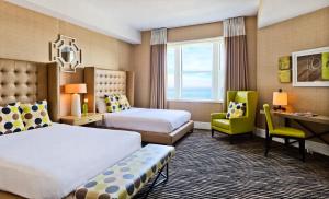 Voodi või voodid majutusasutuse Berkeley Oceanfront Hotel toas