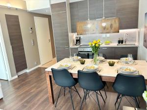 Dapur atau dapur kecil di Kivilinna Apartments Vuokatti - Liinavaatteet,pyyhkeet ja loppusiivous sisältyvät hintaan