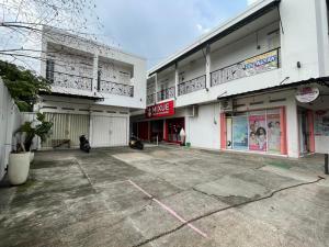 an empty parking lot in front of a building at Rent Studio2 full furnished in Jakarta