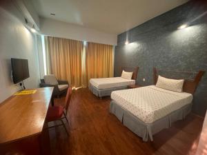 Postel nebo postele na pokoji v ubytování MAYRES HOTEL