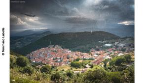 a town on top of a hill with a city at CASA LaCosta in Pettoranello di Molise
