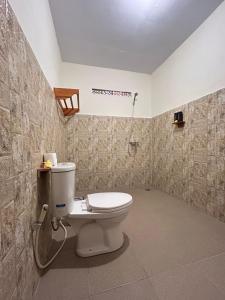 Koupelna v ubytování Buntera Homestay Sidemen + 37 fotografií