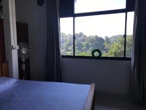 Postel nebo postele na pokoji v ubytování S V homestay + 6 fotografií