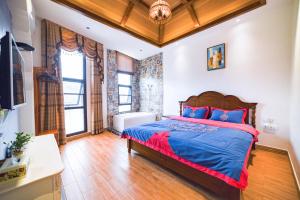 เตียงในห้องที่ Zhangjiajie Han Exotic Inn