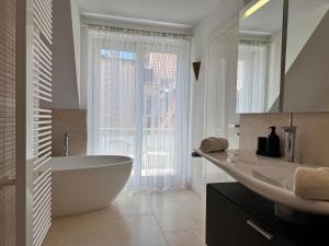 Bilik mandi di Penthousewohnung Langenargen +71 gambar
