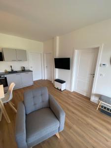 TV a/nebo společenská místnost v ubytování Luxe appartement in Zuid Karinthië