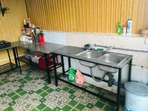 Kuchyň nebo kuchyňský kout v ubytování CSLTDL Nụ Tầm Xuân Homestay + 10 fotografií