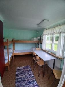 Postel nebo postele na pokoji v ubytování Höljes Camping & Ställplatser
