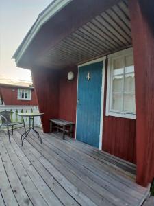 Balkón nebo terasa v ubytování Höljes Camping & Ställplatser