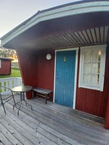 Balkón nebo terasa v ubytování Höljes Camping & Ställplatser