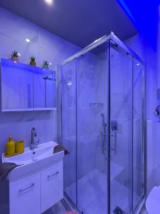 a bathroom with a shower and a sink at Premium Studio DANAI 14 Paralia Beach in Paralia Katerinis +24 photos