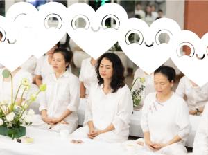 a group of people dressed in white in front of hearts at Nhà Bên Đồi - The Hill House in La Sơn