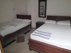 Katil atau katil-katil dalam bilik di Blue Ocean Hotel