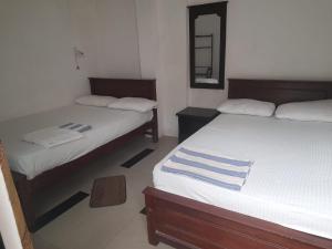 Katil atau katil-katil dalam bilik di Blue Ocean Hotel
