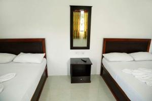 Katil atau katil-katil dalam bilik di Blue Ocean Hotel