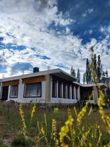 a house in the middle of a field at Nubra Holiday in Deskit