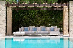 Bazén v ubytování Aphrodite Hills Rentals - Superior Villas nebo v jeho okolí