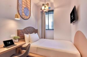 lyf Bugis Singapore managed by The Ascott Ltd的电视和/或娱乐中心