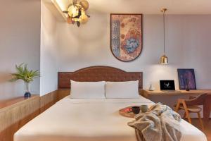 lyf Bugis Singapore managed by The Ascott Ltd客房内的一张或多张床位