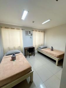 Postel nebo postele na pokoji v ubytování LOC Residence Inn